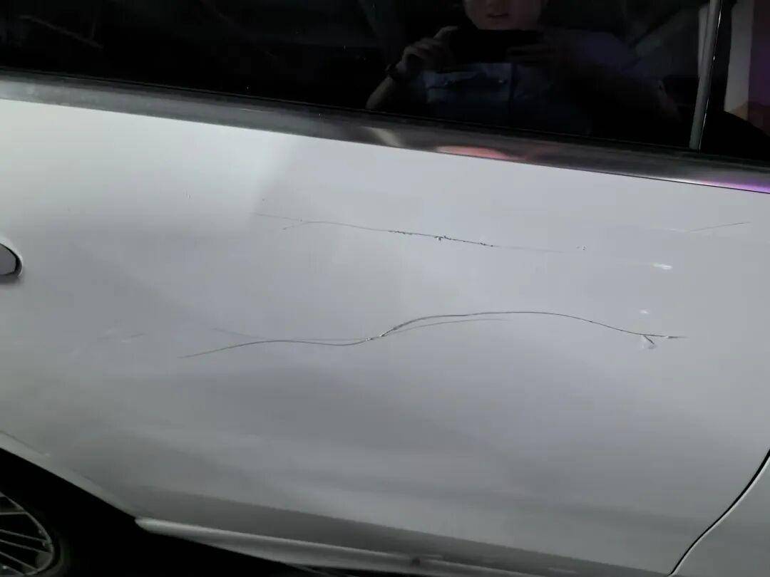 德国vs 北爱尔兰_女子用铁片将邻居奔驰车划开数个口子德国vs 北爱尔兰,被采取刑事强制措施 双方曾因车门磕碰发生口角